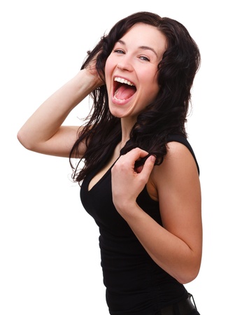 Happy young attractive girl is screaming, isolated over whiteの写真素材