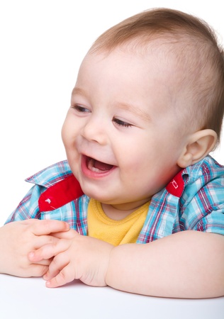 Portrait of a cute little boy, isolated over whiteの写真素材