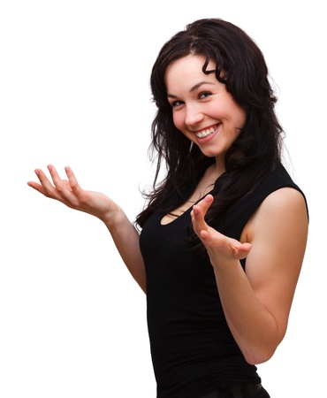 Young woman explaining something gesturing with hands, isolated over whiteの写真素材