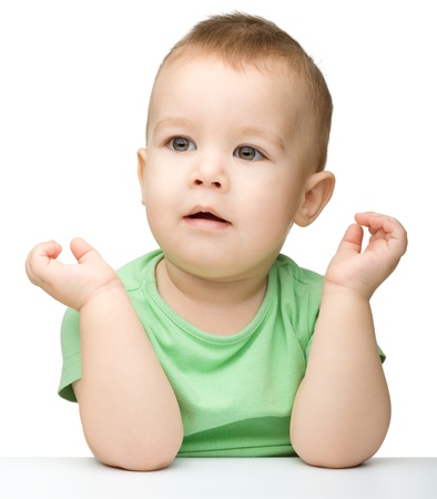Portrait of a cute little boy, isolated over whiteの写真素材