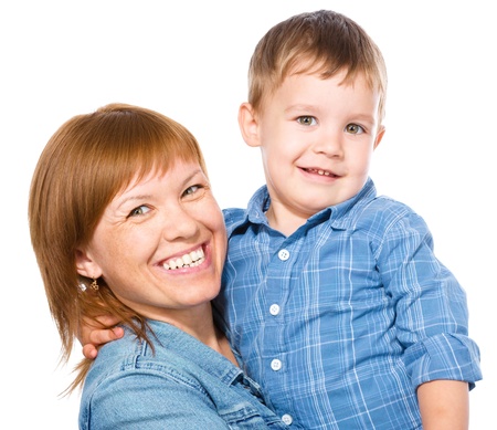 Portrait of a happy mother with her son, isolated over whiteの写真素材