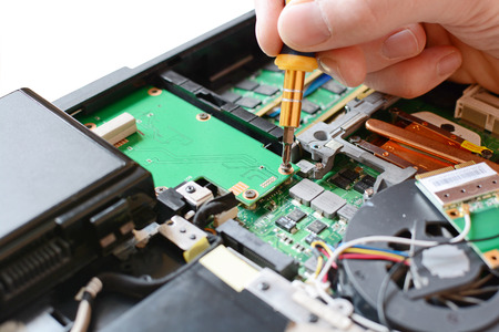 repair Computers, IT technicians, Screwdriver in the hands of, blurred backgroundの写真素材