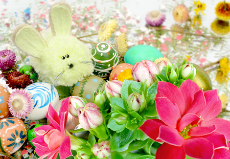 Easter holiday. Easter eggs with a rabbit and flowers