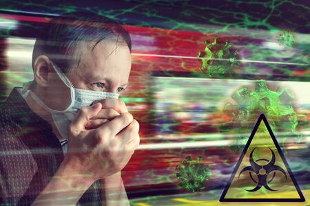 Concept of the spread of coronavirus, influenza in public transport, metro. Man in a medical mask...