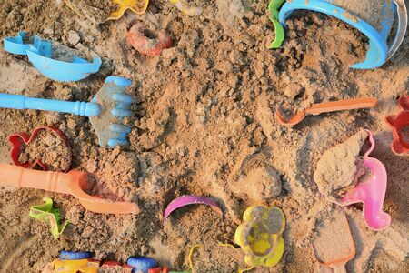 Children's sandbox with various toys for the game. River sandの写真素材