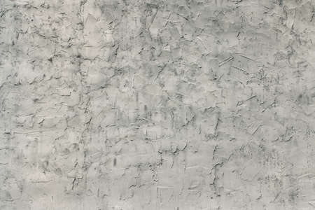 Wall is plastered with cement mortar. Gray backgroundの写真素材