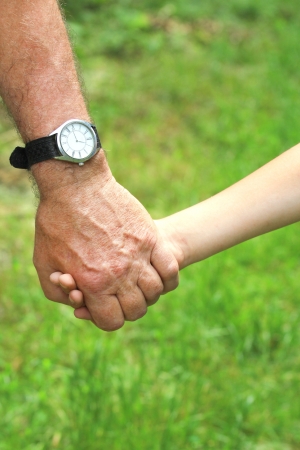 hand of a parent and childの写真素材