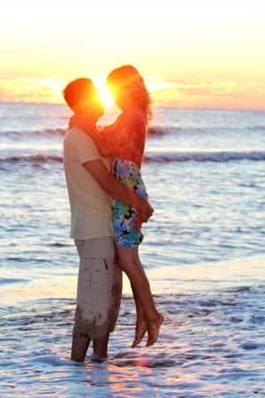 couple on the shore of the seaの写真素材