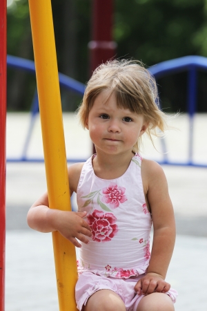 beautiful little girl on natureの写真素材