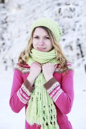 young woman in a park in winterの写真素材