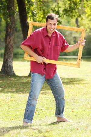 the man in the picture framesの写真素材