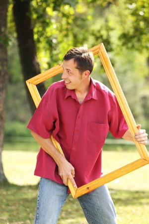 the man in the picture framesの写真素材