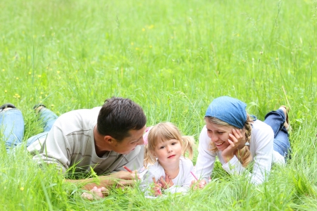 a young family on the natureの写真素材