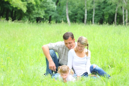 a young family on the natureの写真素材