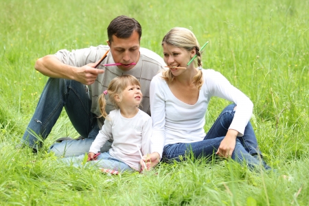 a young family on the natureの写真素材