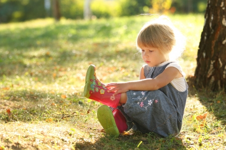 a very beautiful little girl on natureの写真素材