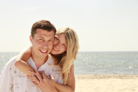 couple in love on the shore of the seaの写真素材