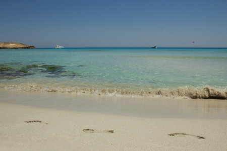 a footprints in the sand on the beachのeditorial素材