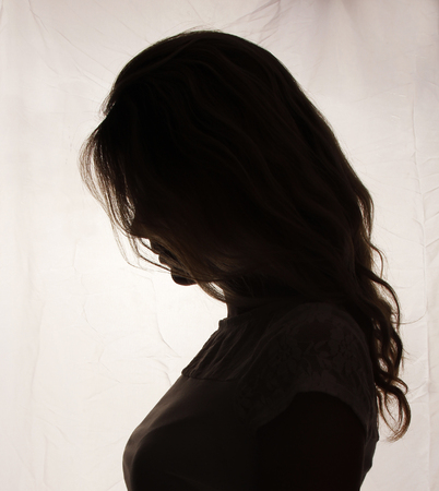 silhouette of  Pregnant woman on a white backgroundの写真素材