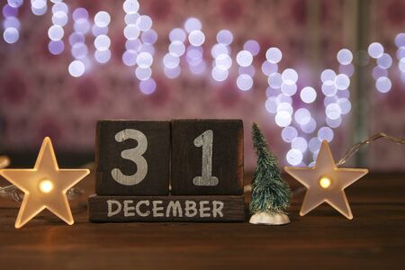 wooden christmas date with backgroundの写真素材