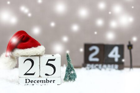 wooden christmas date with holiday background