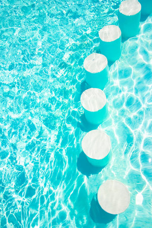 Step in the pool by the sea nature background. For bathing turquoise water.