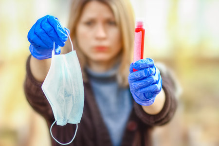 virus blood test in a girl in hands 2019-2020. Crown virus outbreak. Epidemic viral respiratory syndrome.の写真素材