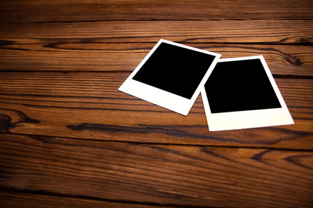 Photo album nostalgia photography on a wooden backgroundの写真素材