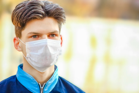 masked man from coronavirus and air. Protection against PM 2.5 air polluted from the virus in Europe and Asiaの写真素材