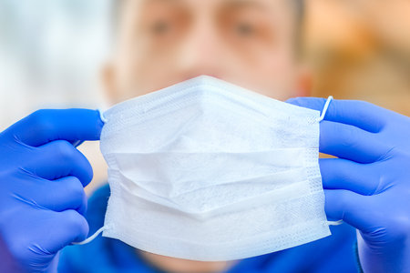 masked man from virus and air. Protection against PM 2.5 air polluted from the virus in Europe and...