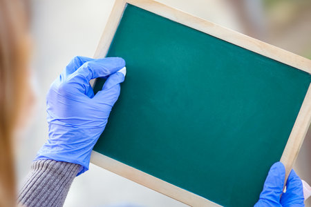 virus Outbreak of the virus. Epidemic Viral Respiratory Syndrome. Girl's Plate in Hands.の写真素材