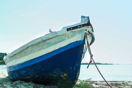 old rare beautiful boat in the sea on nature background