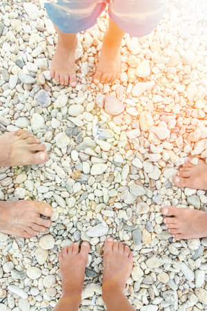 beautiful legs in the sand of the sea greece backgroundの写真素材