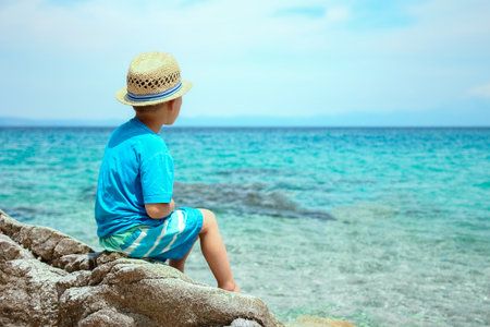 happy child playing at sea in parkの写真素材