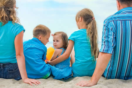 happy family at sea in greece on nature backgroundの写真素材