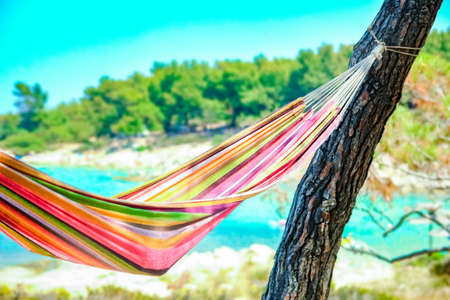 beautiful hammock on sea in greece on nature backgroundの写真素材