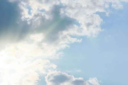 Fantastic soft white clouds against blue skyの写真素材