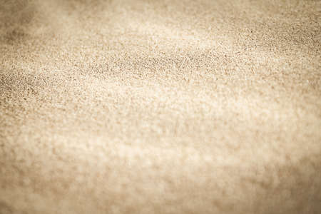 Sand by the sea on vacation traveling background.の写真素材