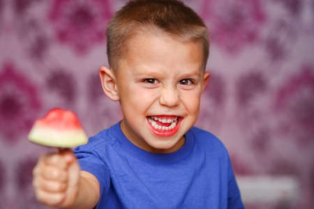 happy baby with watermelon at home