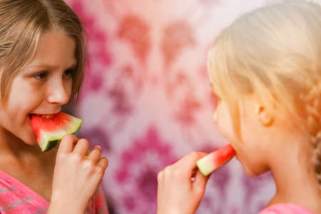 happy baby with watermelon at homeの写真素材
