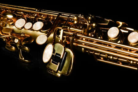 soprano saxophone on black backgroundの写真素材