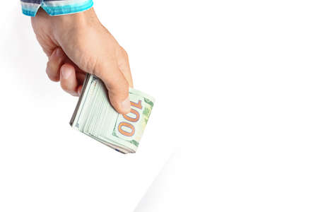 Money dollars in the hands on a white background