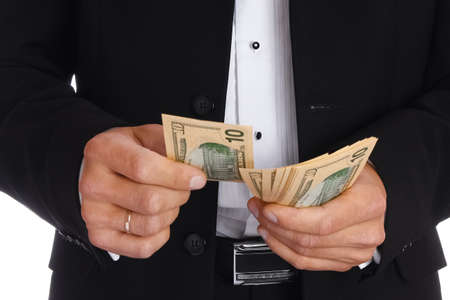 Business man holding money on white background