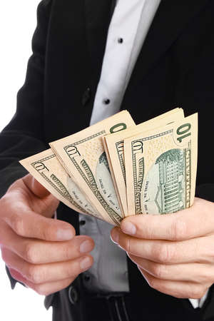 Business man holding money on white background