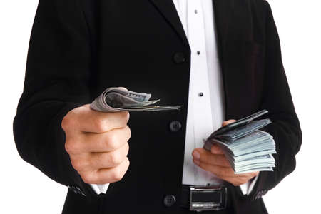 Business man holding money on white background