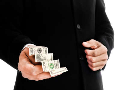 Business man holding money on white background