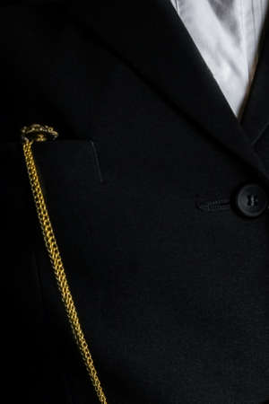 pocket watch in the hands of a manの写真素材