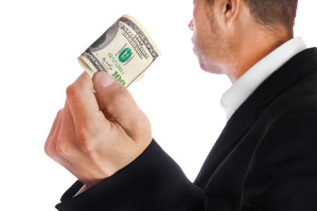Business man holding money on white background