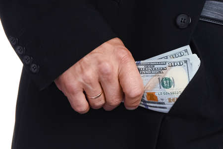 Business man holding money on white background