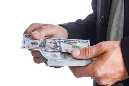 Business man holding money on white background